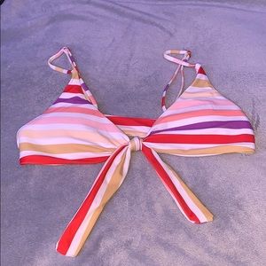 never worn striped multi color runs kind of big